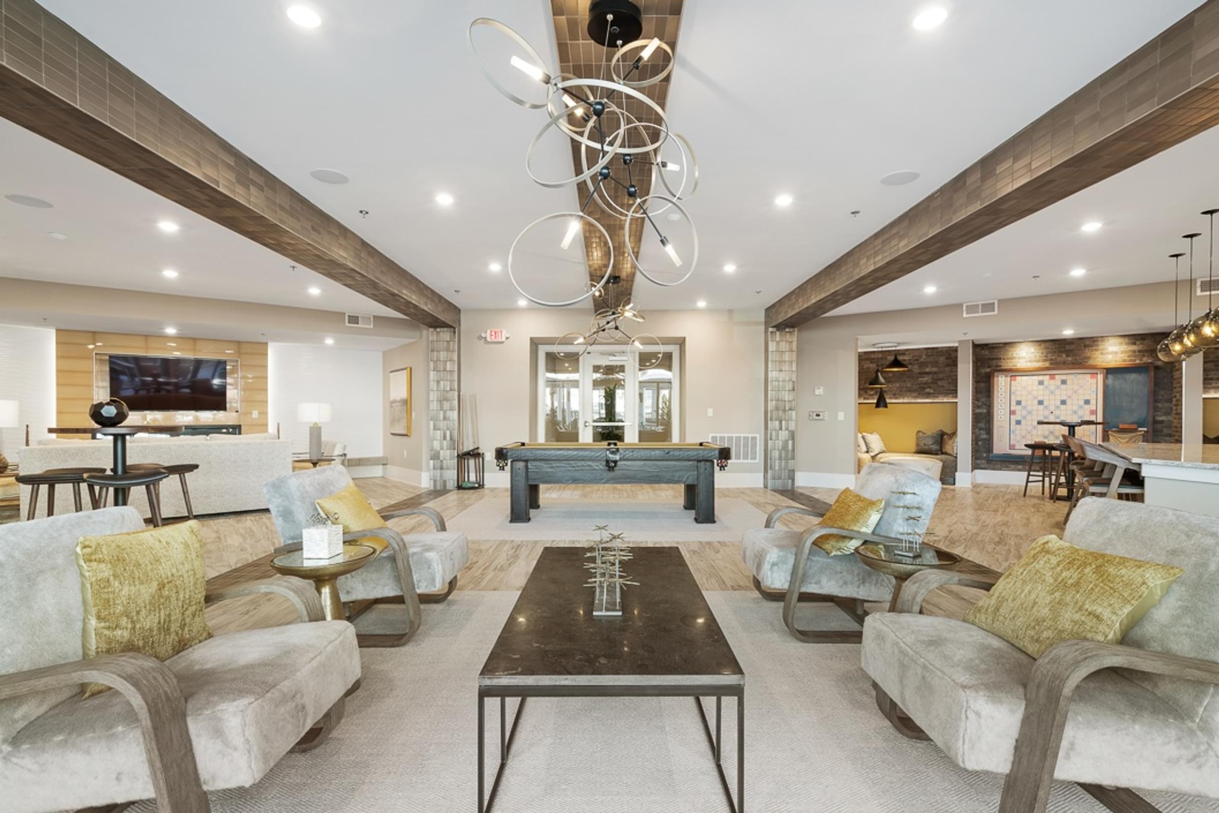 Clubhouse with Various Lounge Areas and a Pool Table