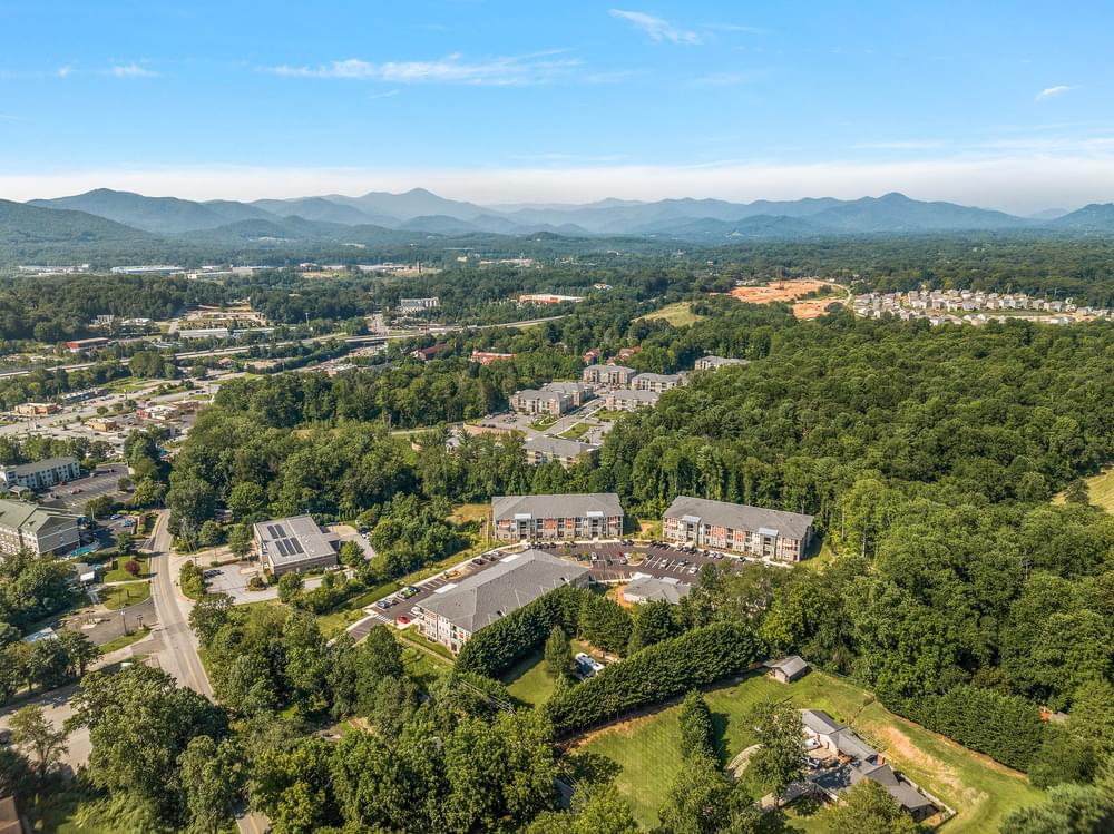 arial view of the campus with mountains in the background