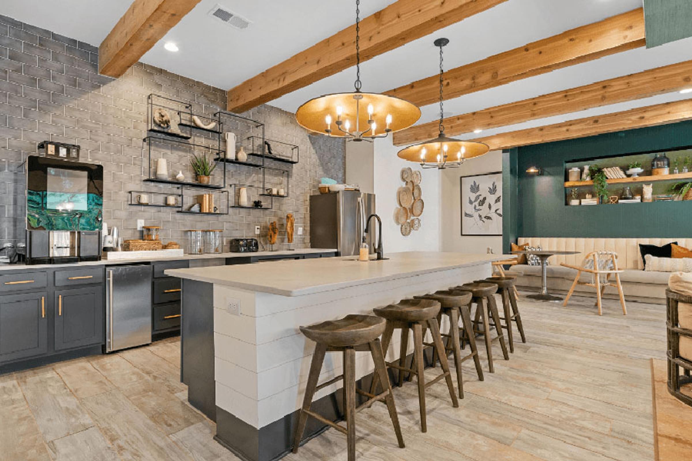 modern clubhouse to co work or hangout with friends with coffee bar and large island