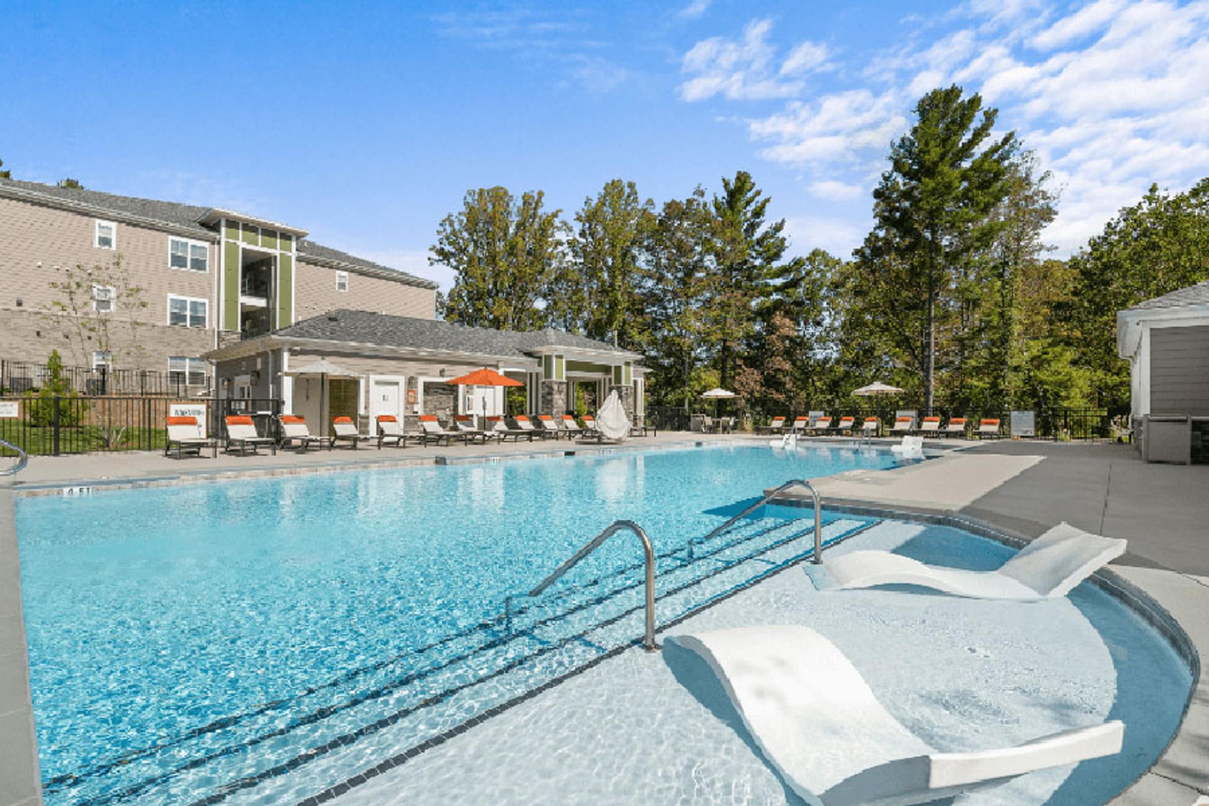 sparkling swimming pool with sun shelf