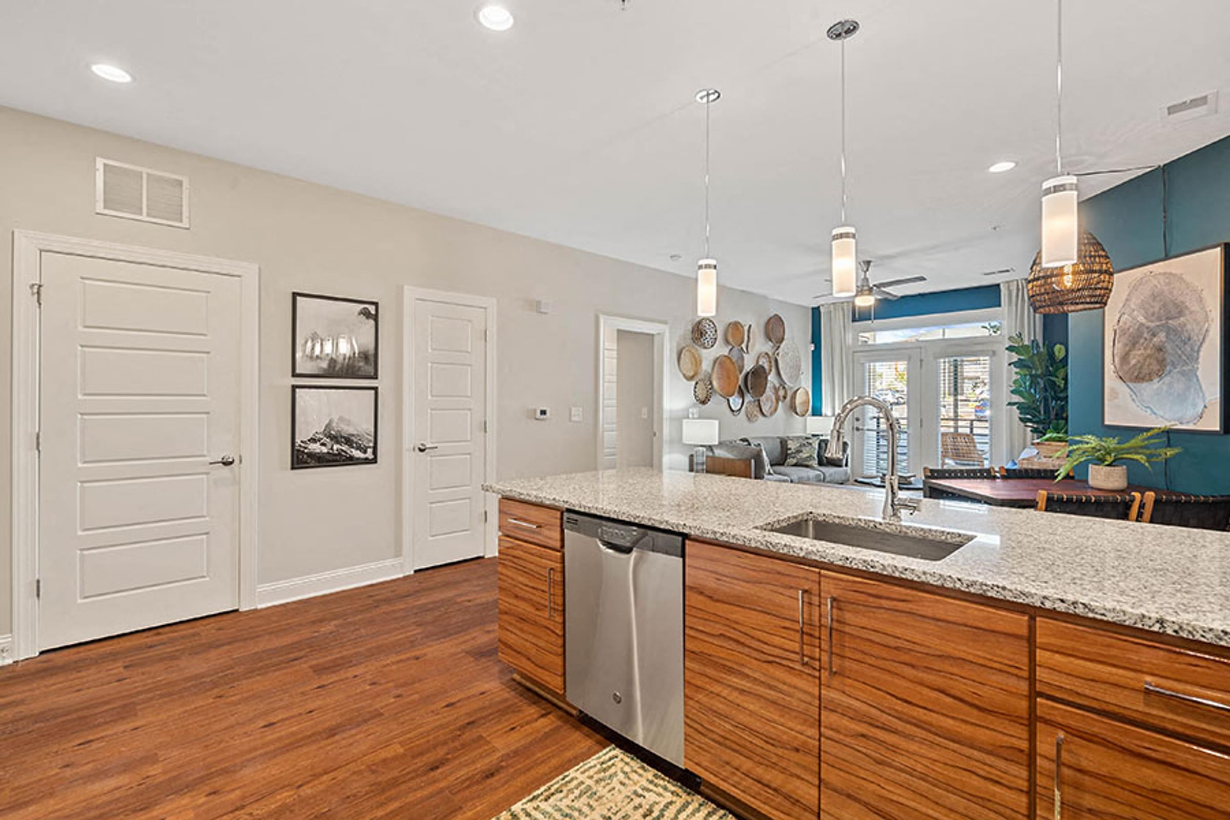a kitchen with a sink and a counter top