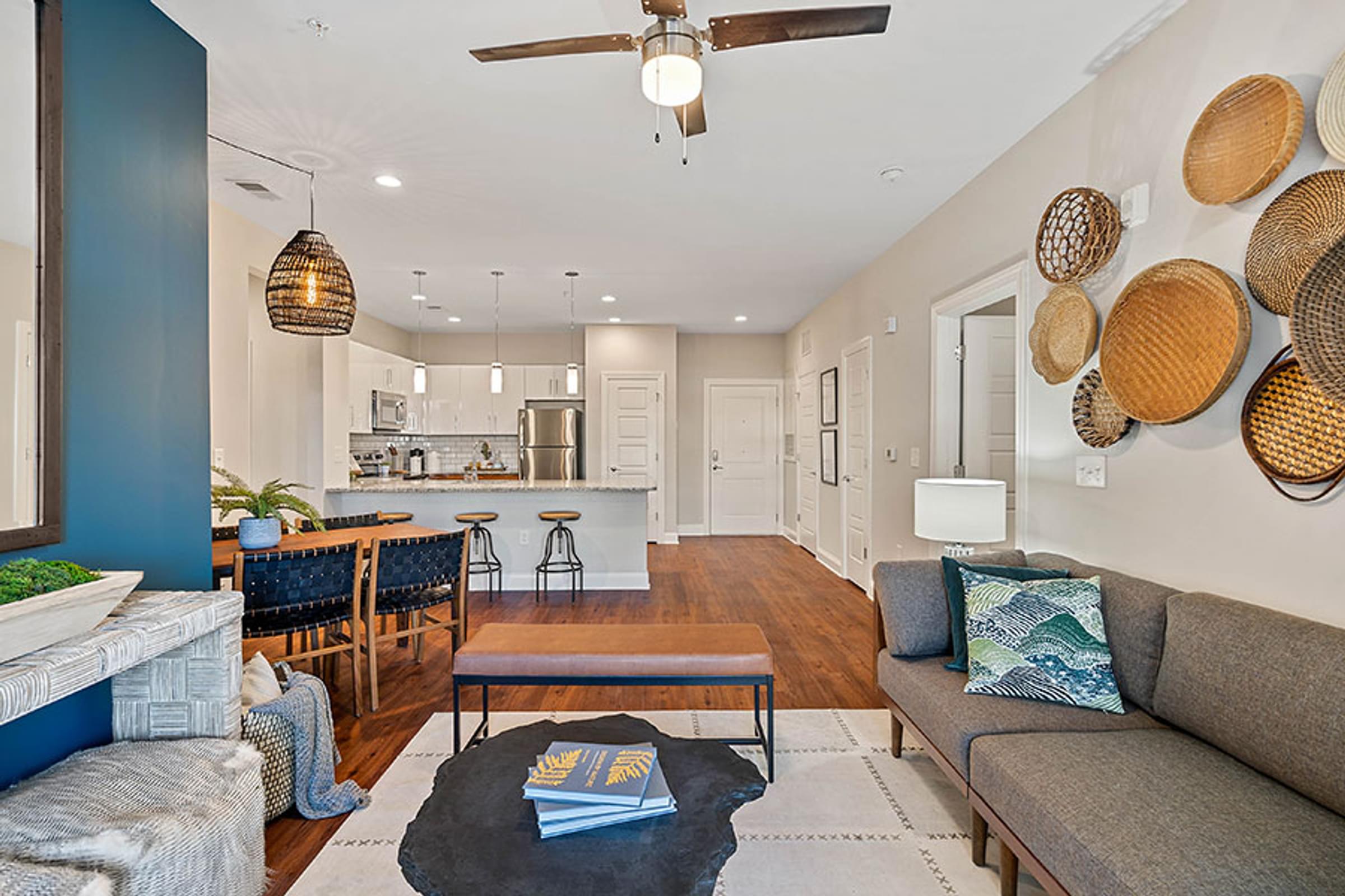 Open Concept Living Room that Peeks into the Kitchen
