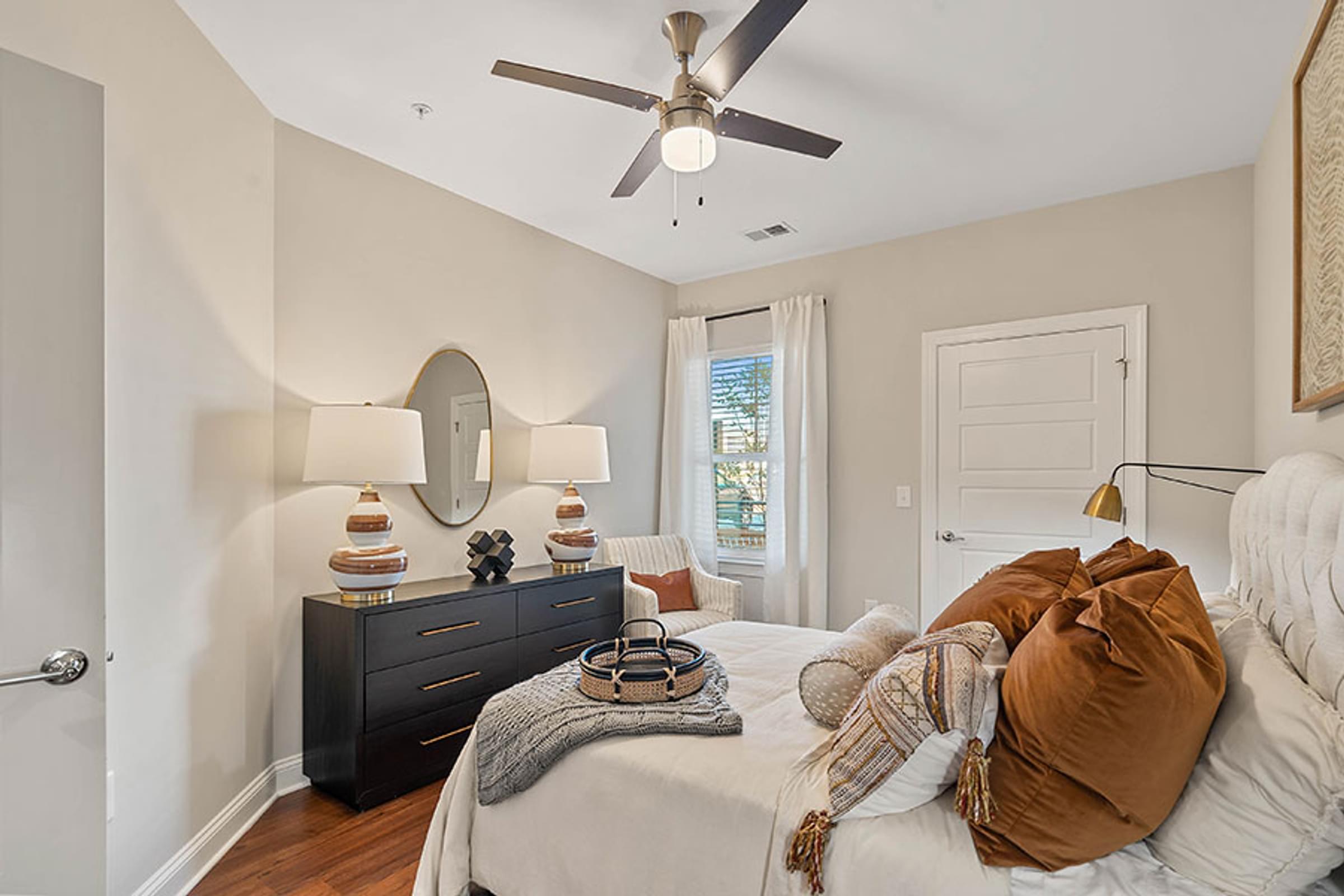 Spacious Bedrooms with Large Windows, Ceiling Fan and Walk-In Closets