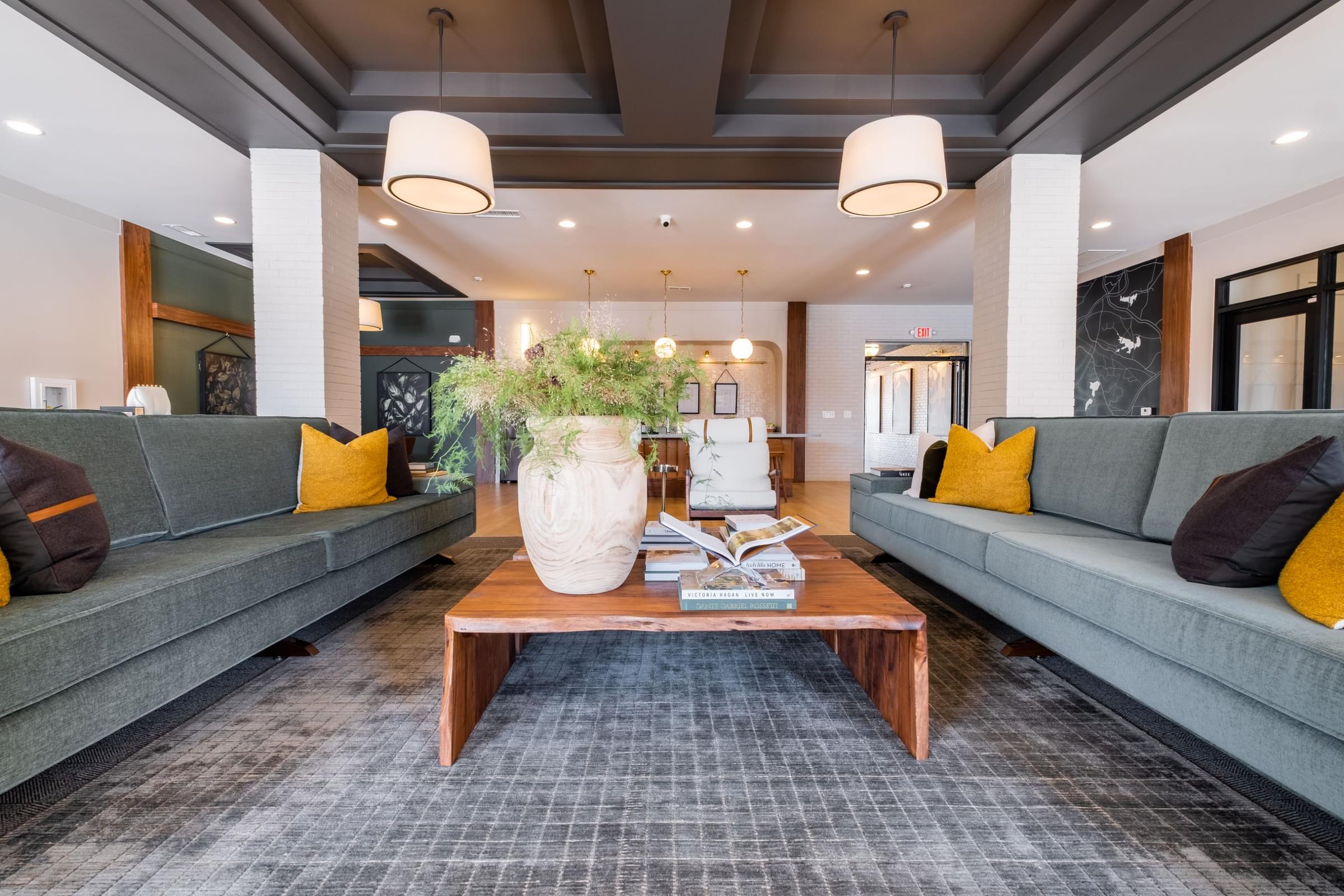 a living room with couches and a coffee table