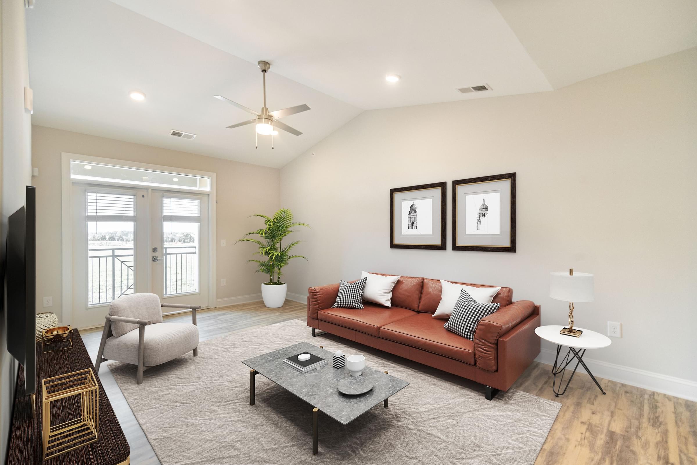Spacious Living Room with Vaulted Ceilings and Private Patio