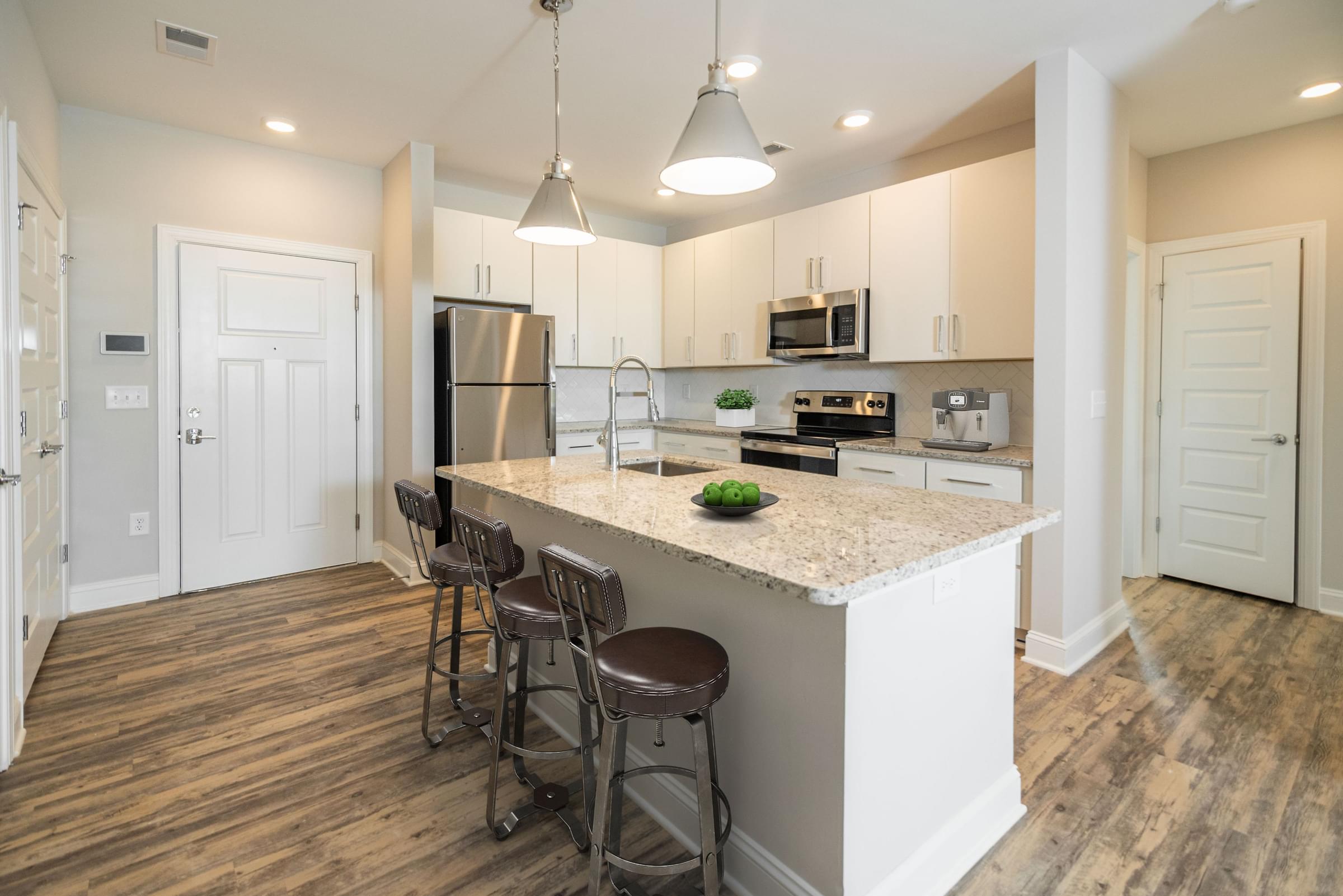 White Kitchen Cabinets with Breakfast Bar Island