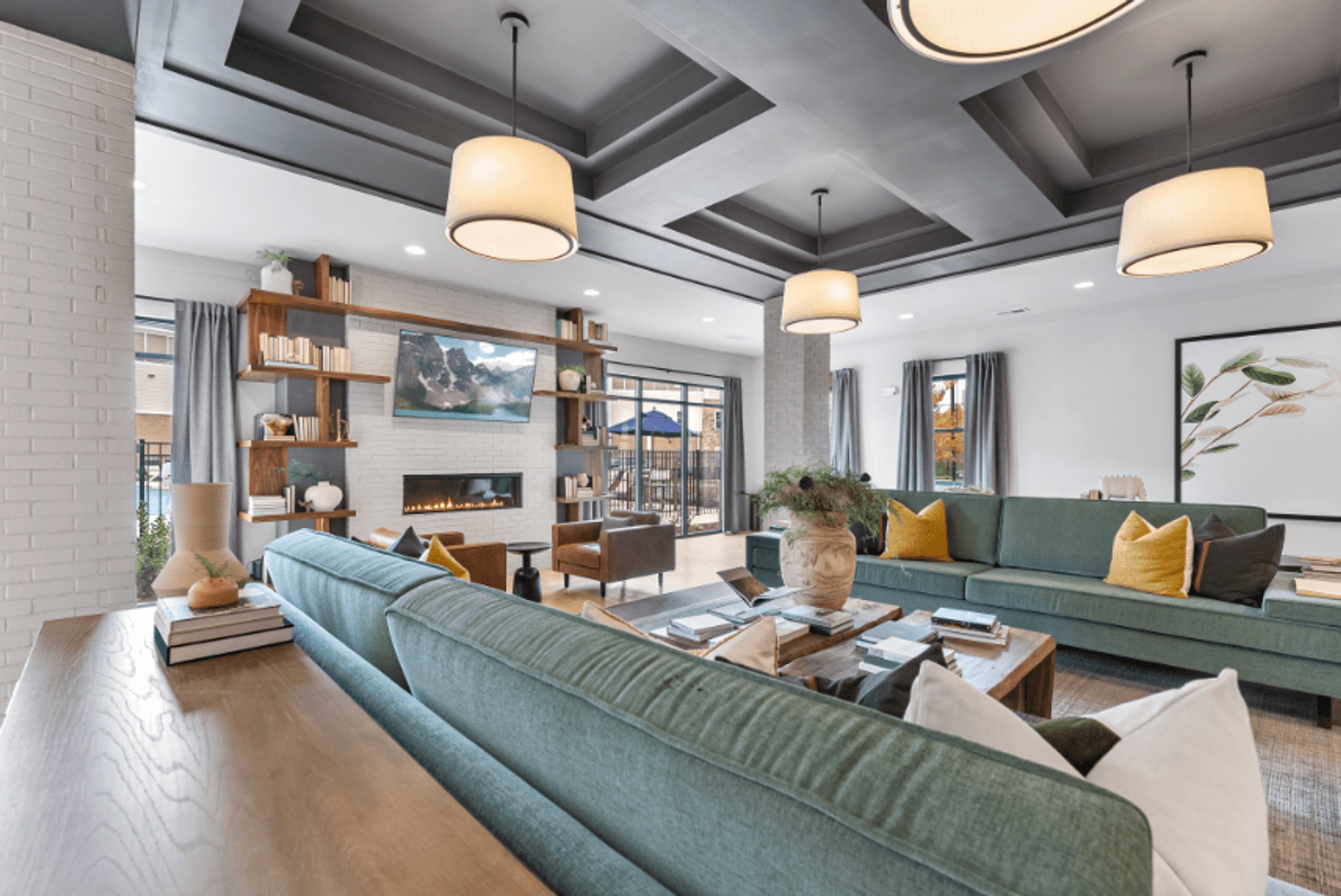 a living room with couches and a fireplace