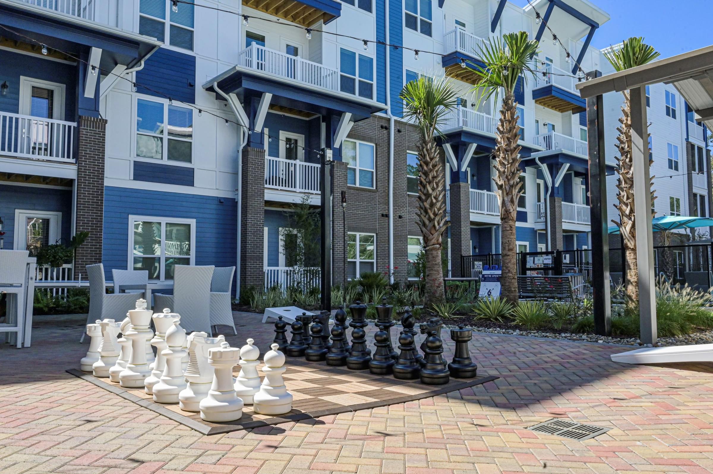 Amenity Courtyard with Large Outdoor Chess Set and Outdoor Seating