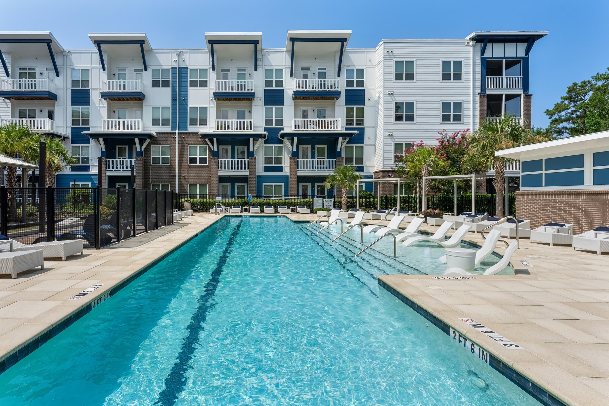 Resort-Style Swimming Pool with Cabanas for Luxury Lounging