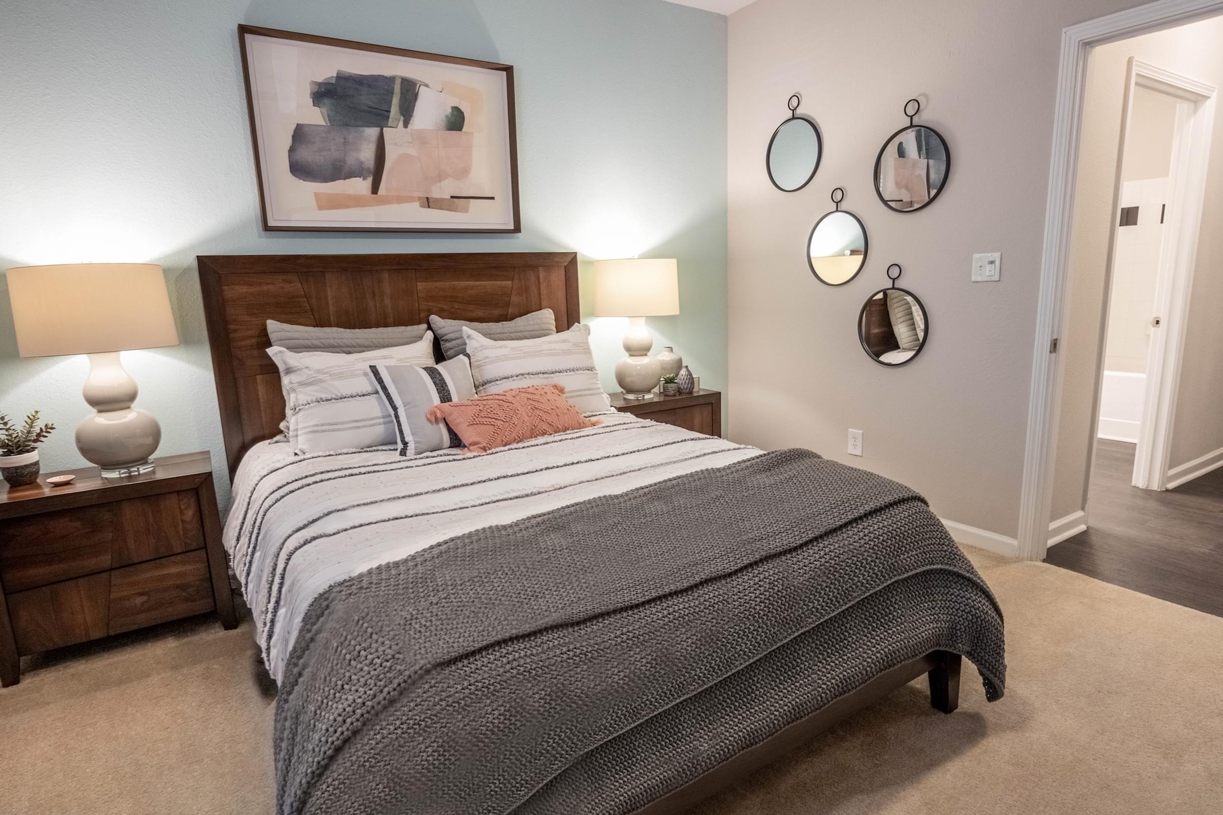 Spacious Bedrooms with Large Windows and Ceiling Fan