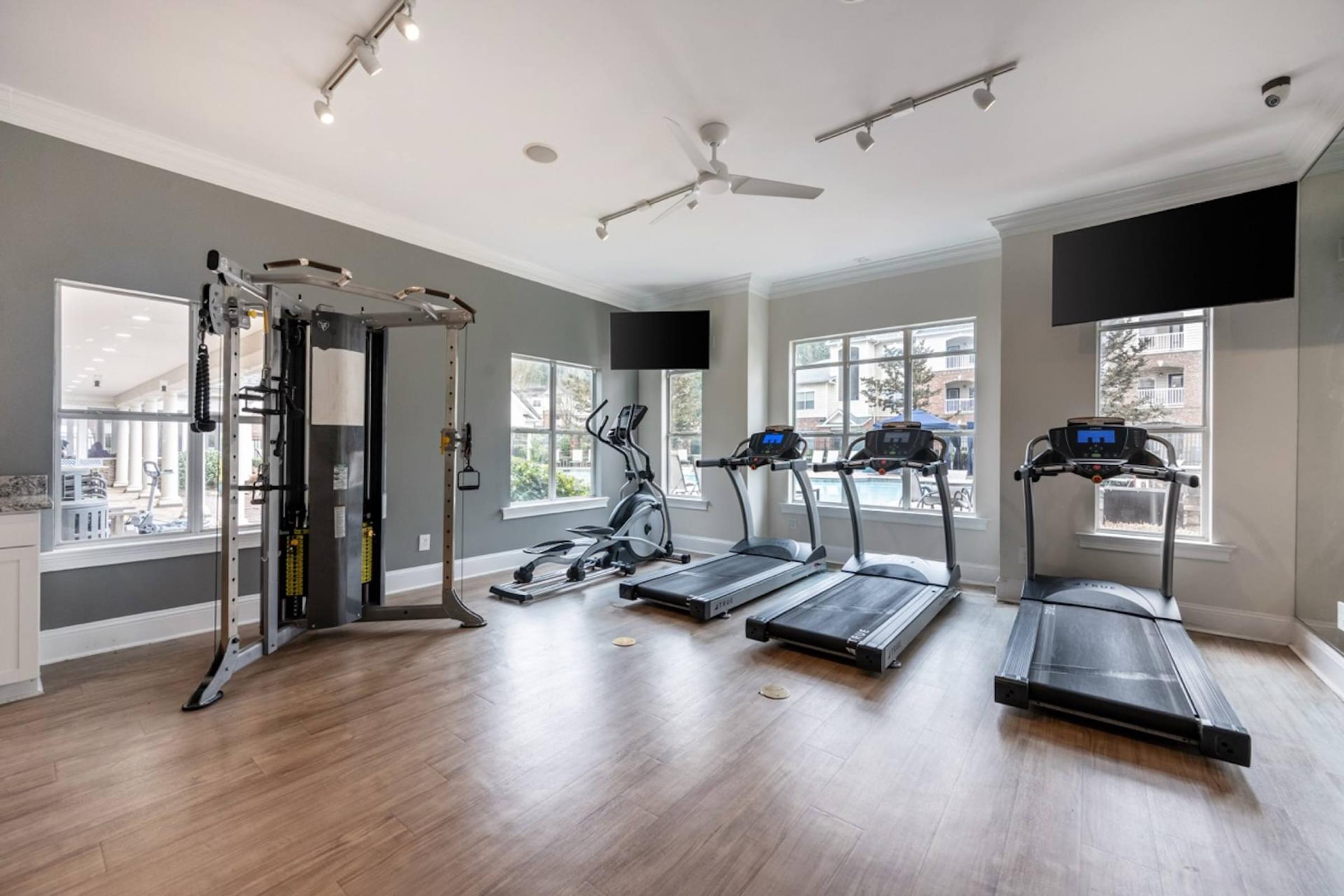 24-Hour Fitness Center with Cardio, Free Weights, and Spin Studio