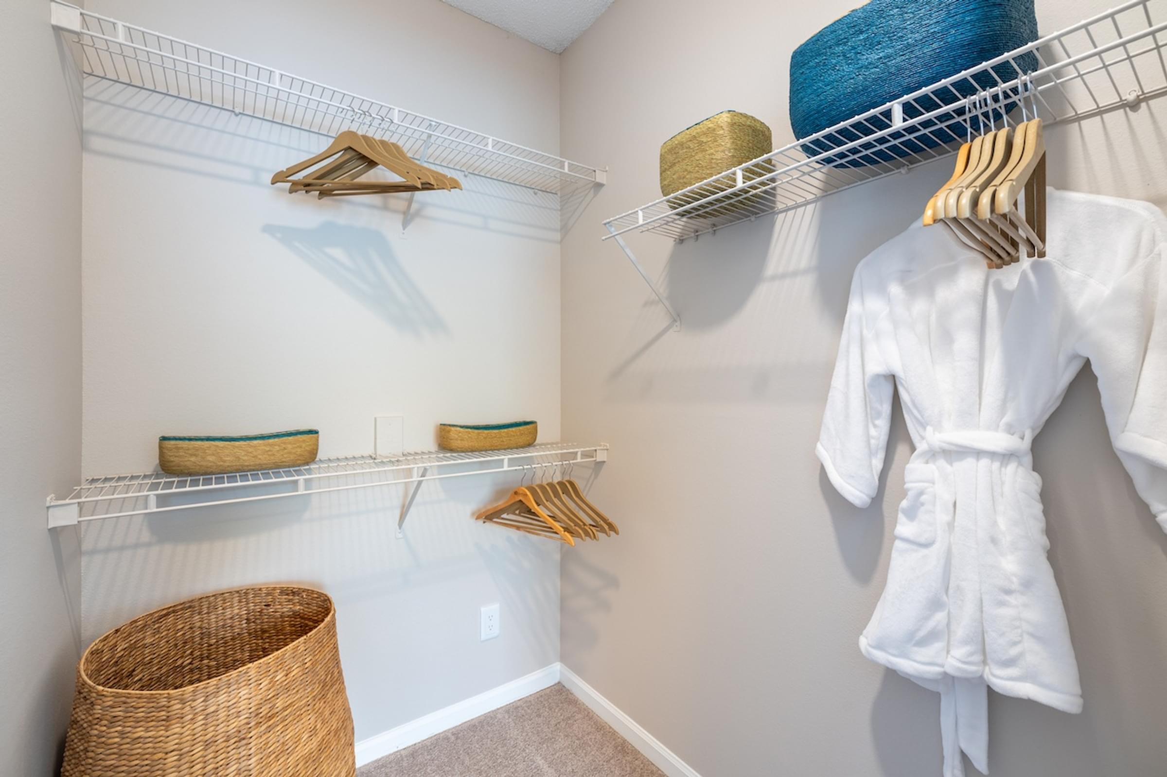 our closets are stocked with robes and hats in our spacious walk in closets