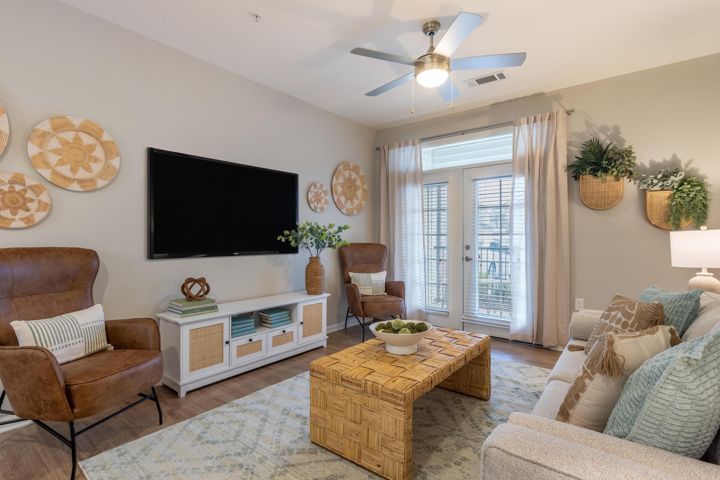Living Room with Light Colored Walls and Plank Flooring