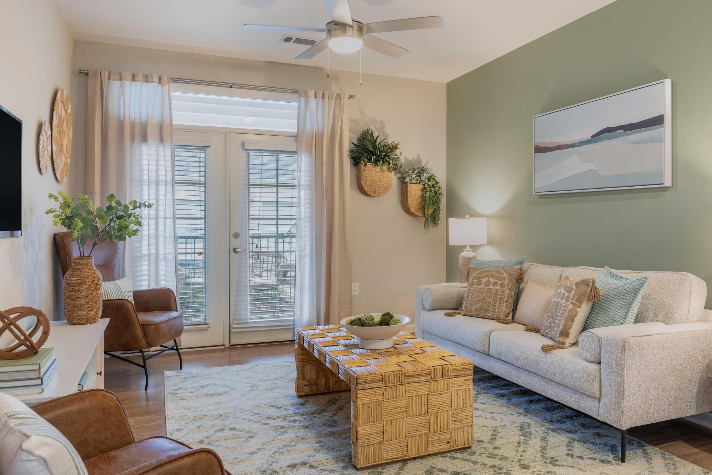 a living room with a couch and a table
