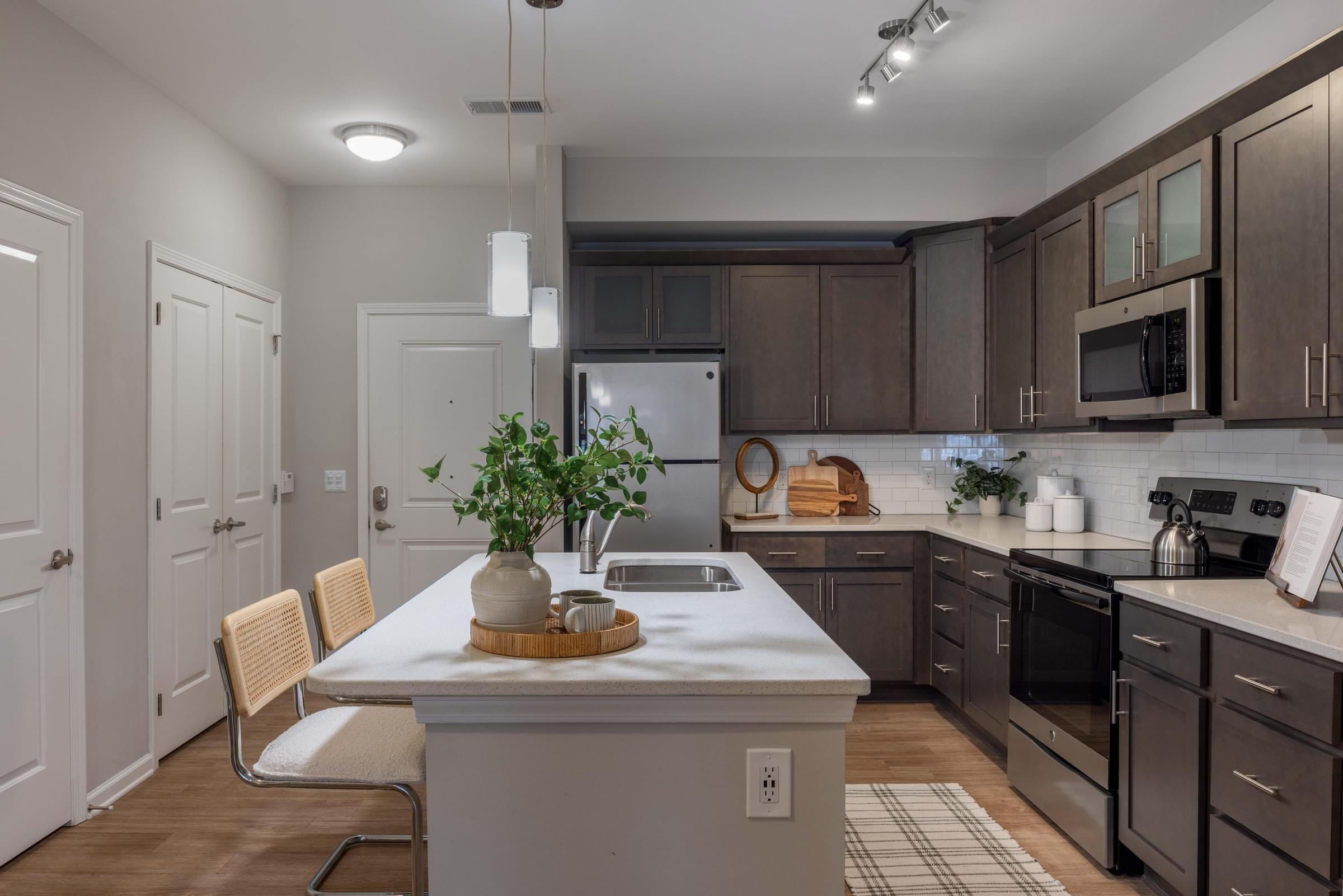 Kitchens with Weathered Gray or Aspen White Cabinetry Available