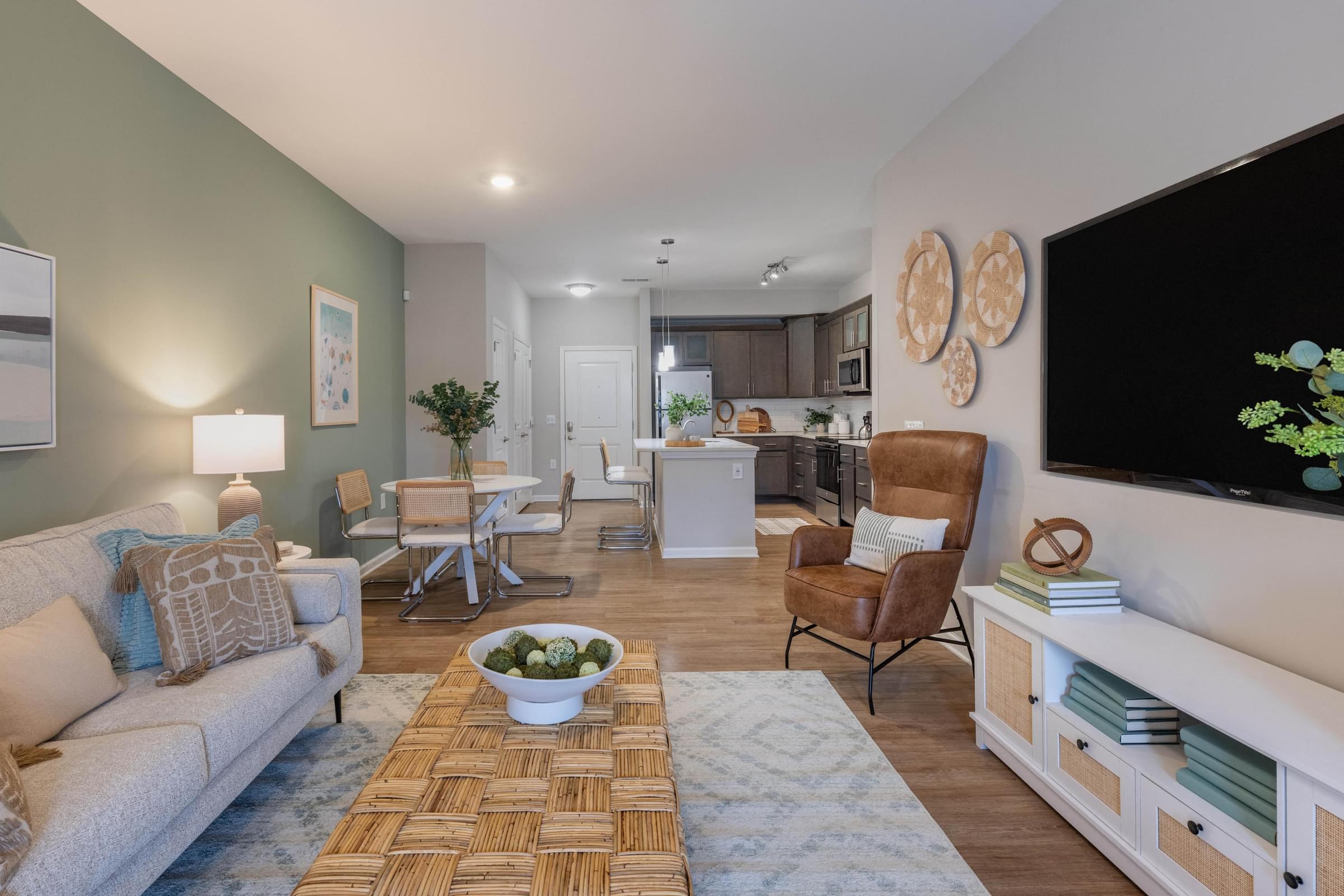 a living room with a couch and a tv