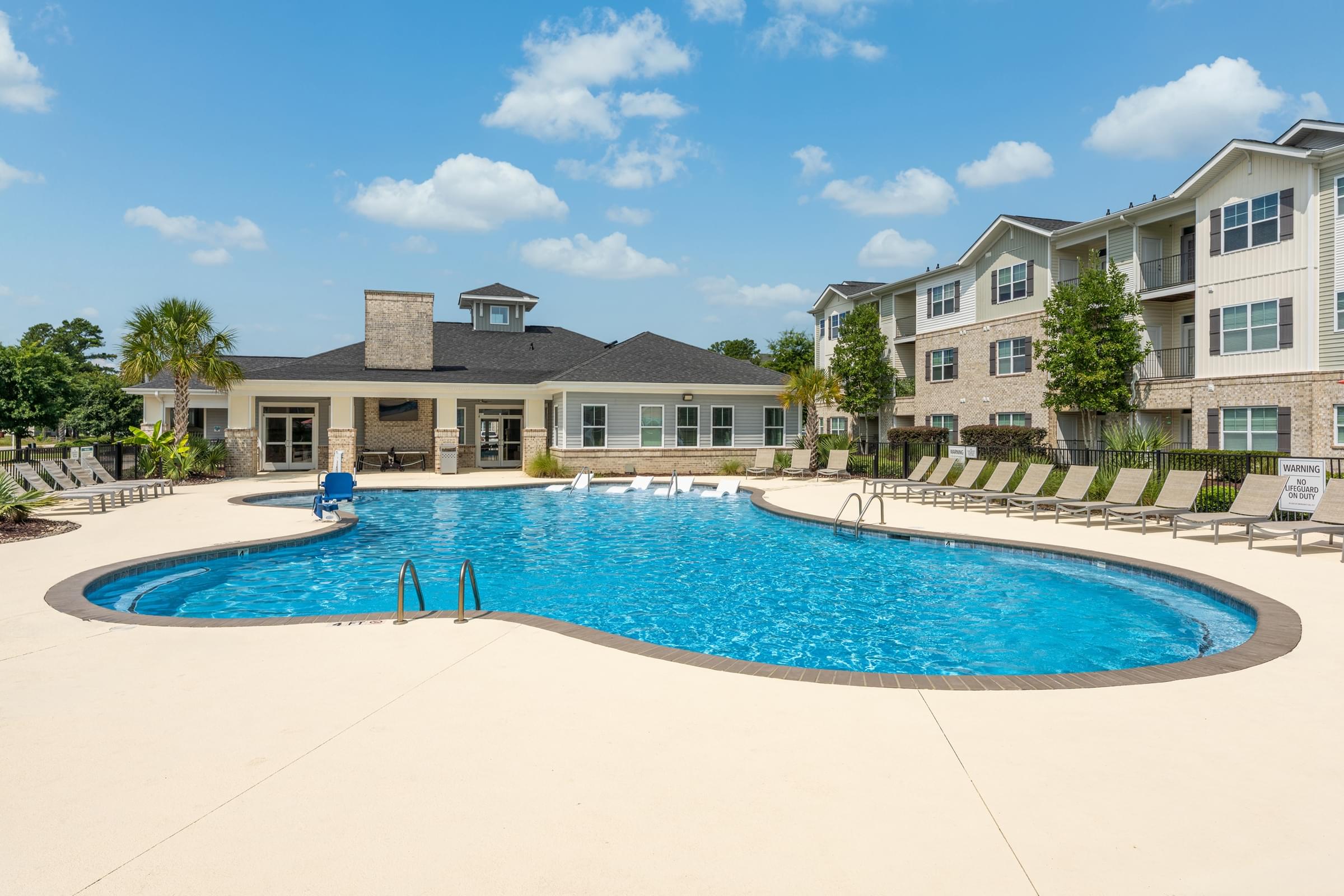 Resort-Style Swimming Pool with Sun Shelf and Expansive Sundeck