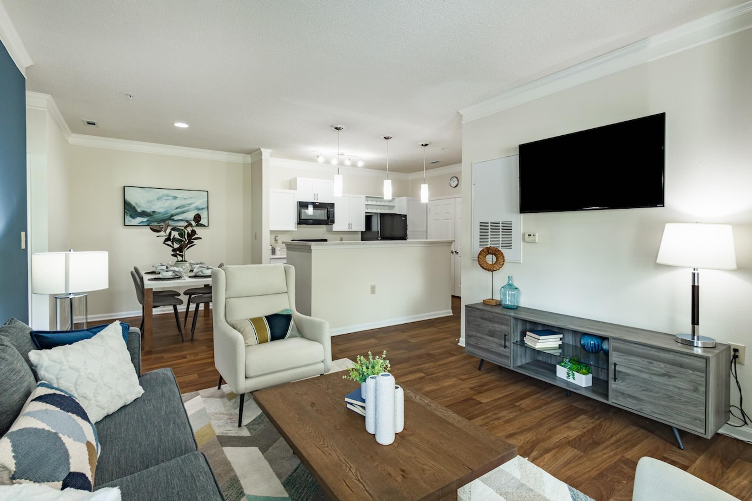 a living room with a couch and a chair