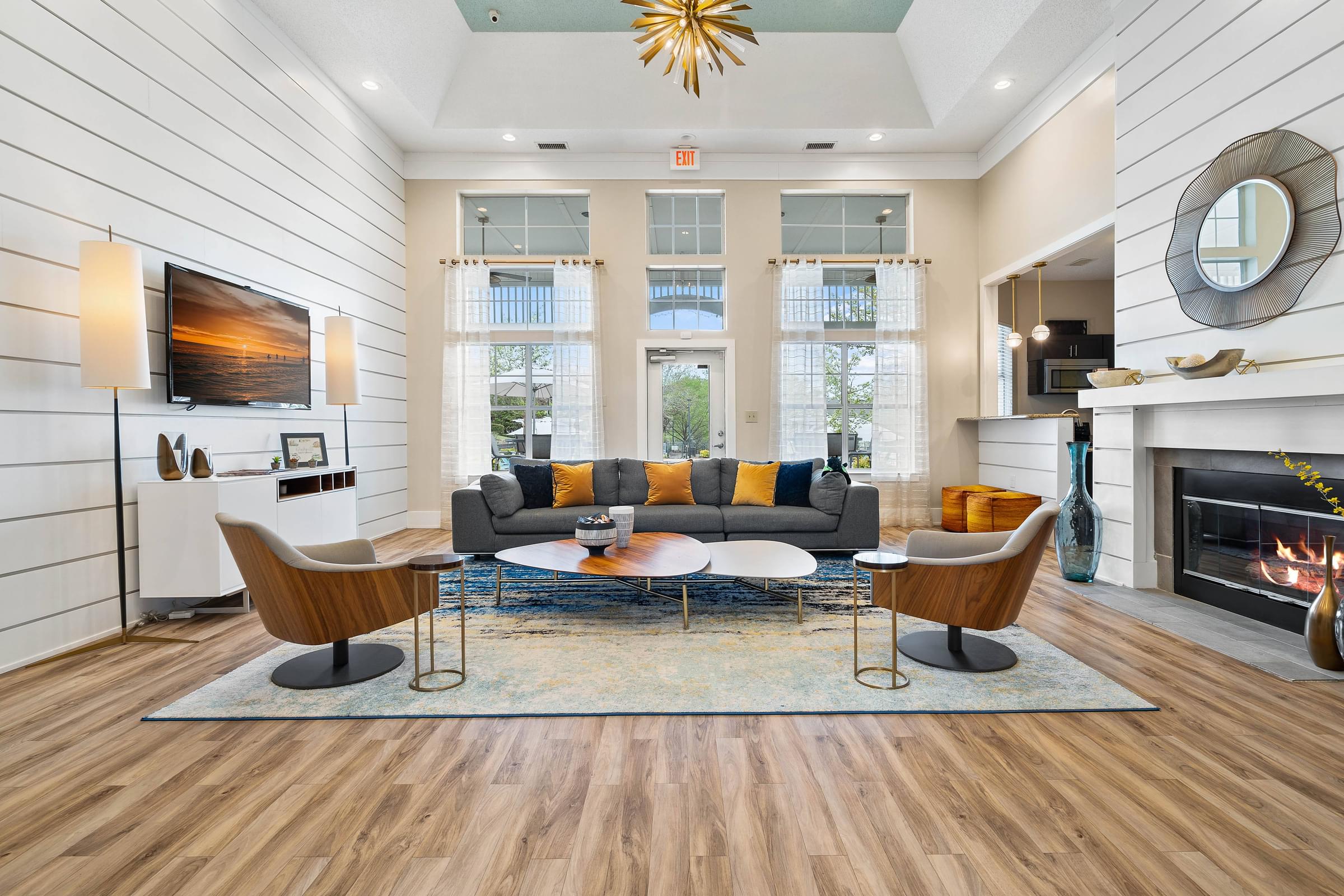 A living room with a fireplace and a couch.