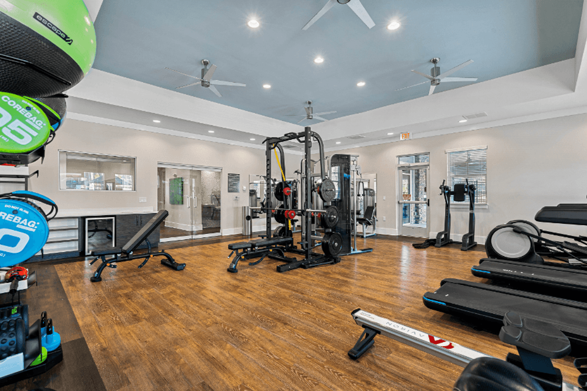 Modern Fitness Center with Cardio and Weight Training Equipment