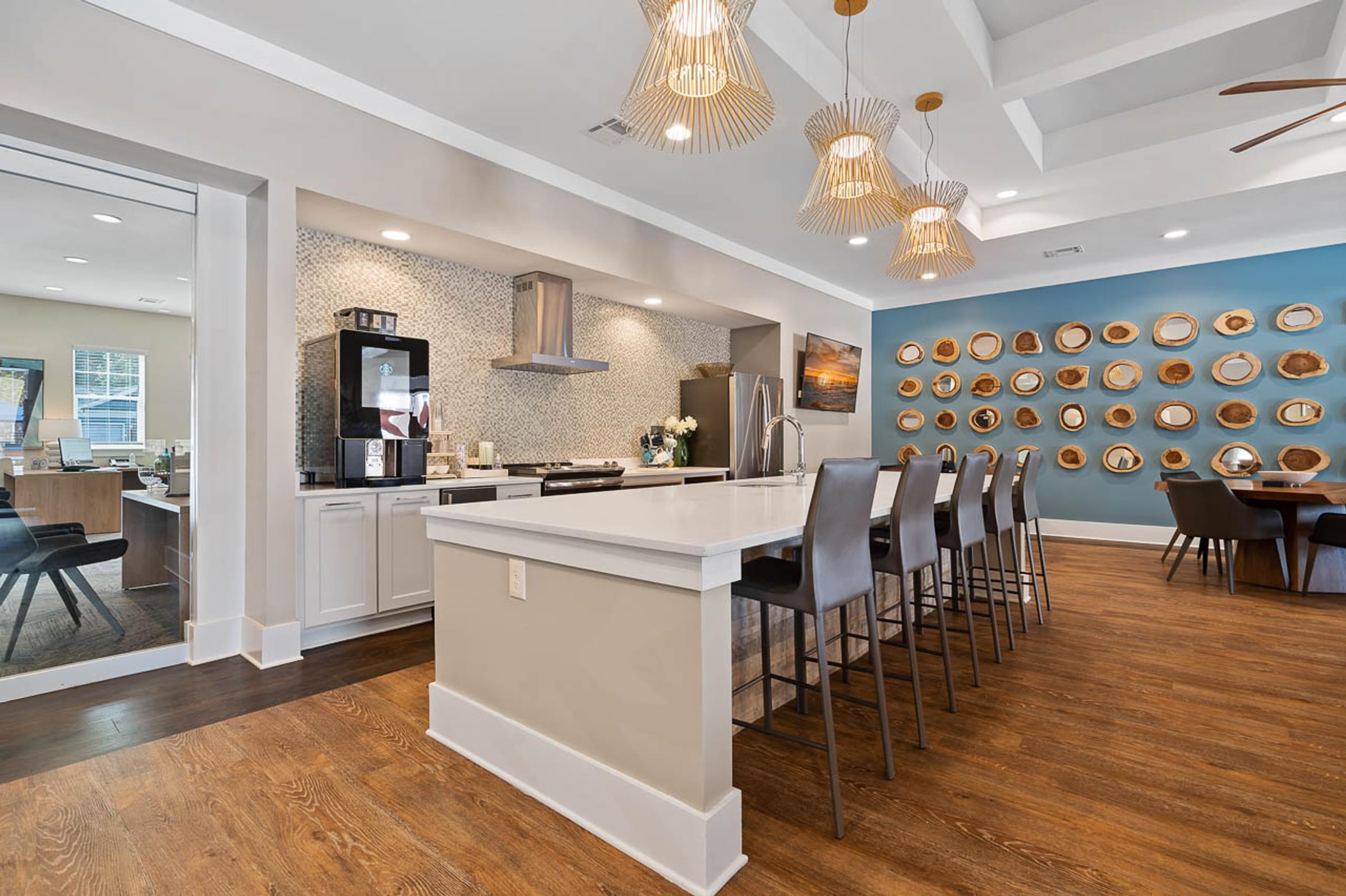 Community Clubhouse with Large Kitchen Island and Gathering Spaces
