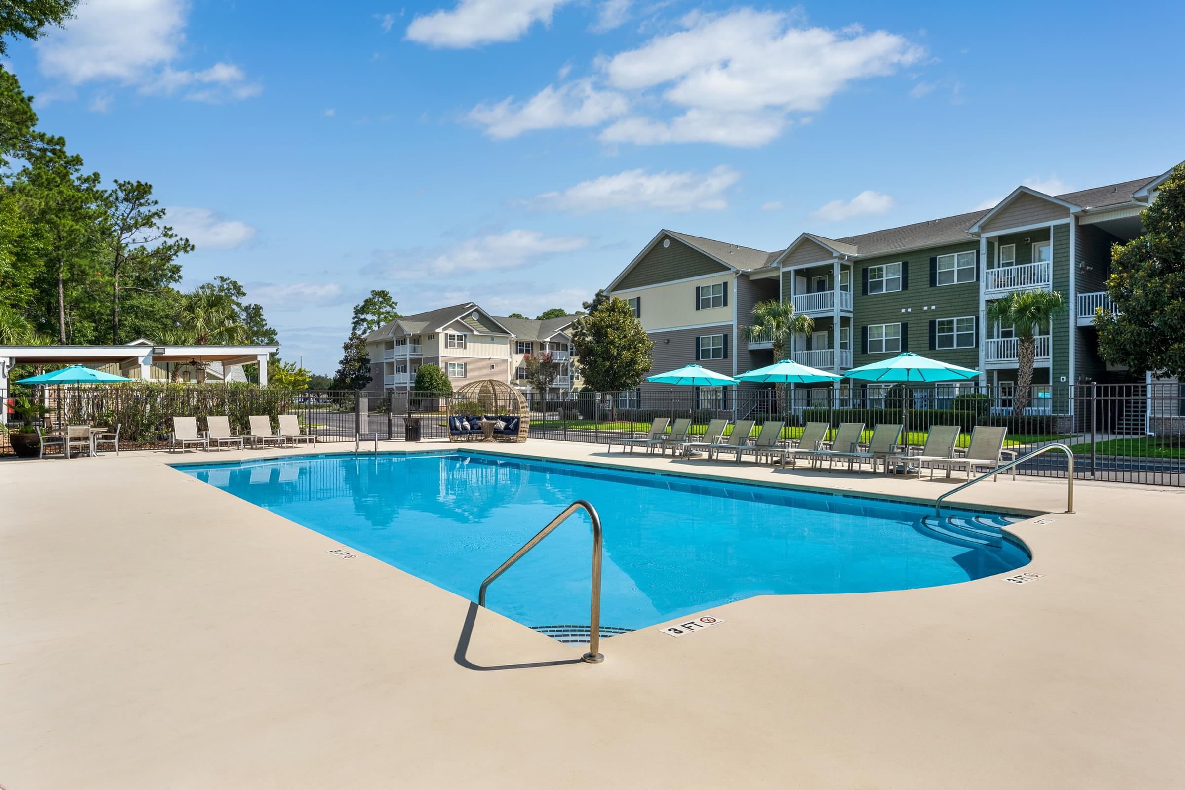 Resort-Style Swimming Pool with Expansive Sundeck