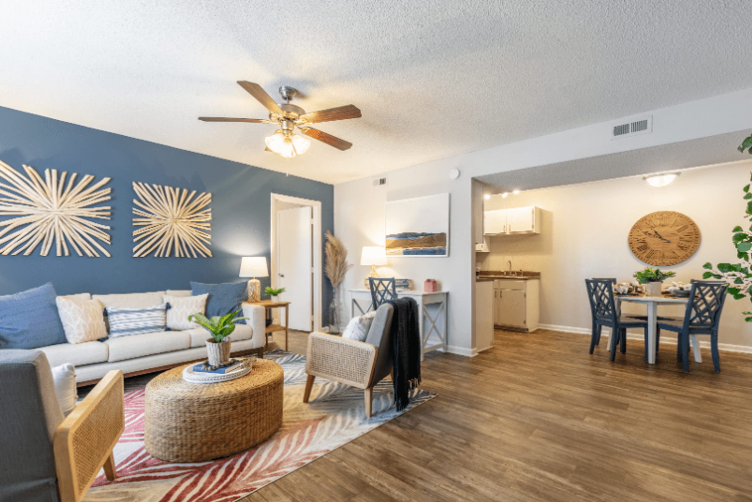 Open Concept Living Room and Kitchen Space with Plank Style Flooring