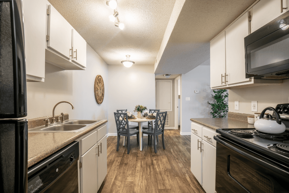 view of kitchen and dining area at the preserve apartments