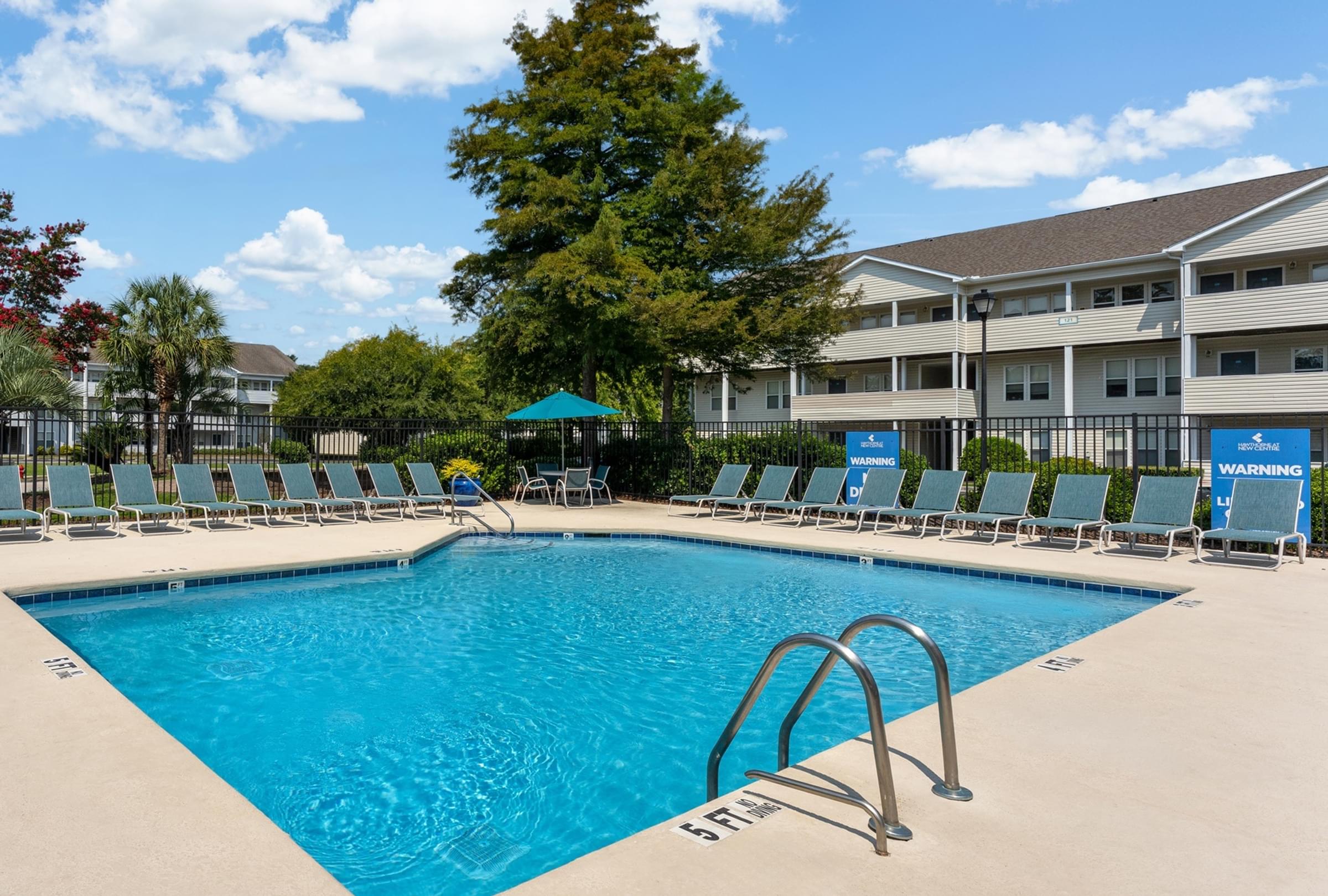 Sparkling Swimming Pool with Expansive Sundeck