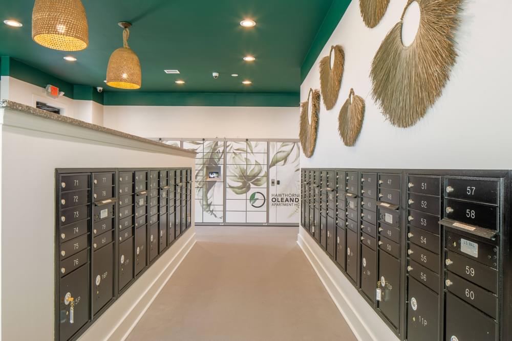 a row of lockers in a room with feathers on the wall