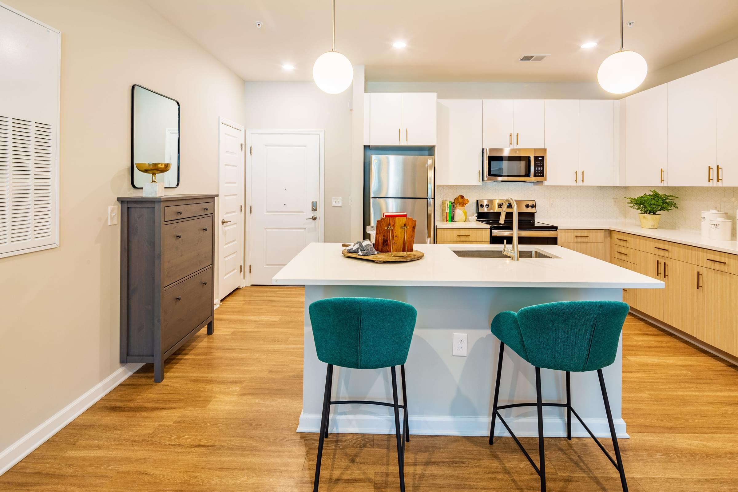 Modern Kitchens with Designer Cabinetry and Tile Backsplash