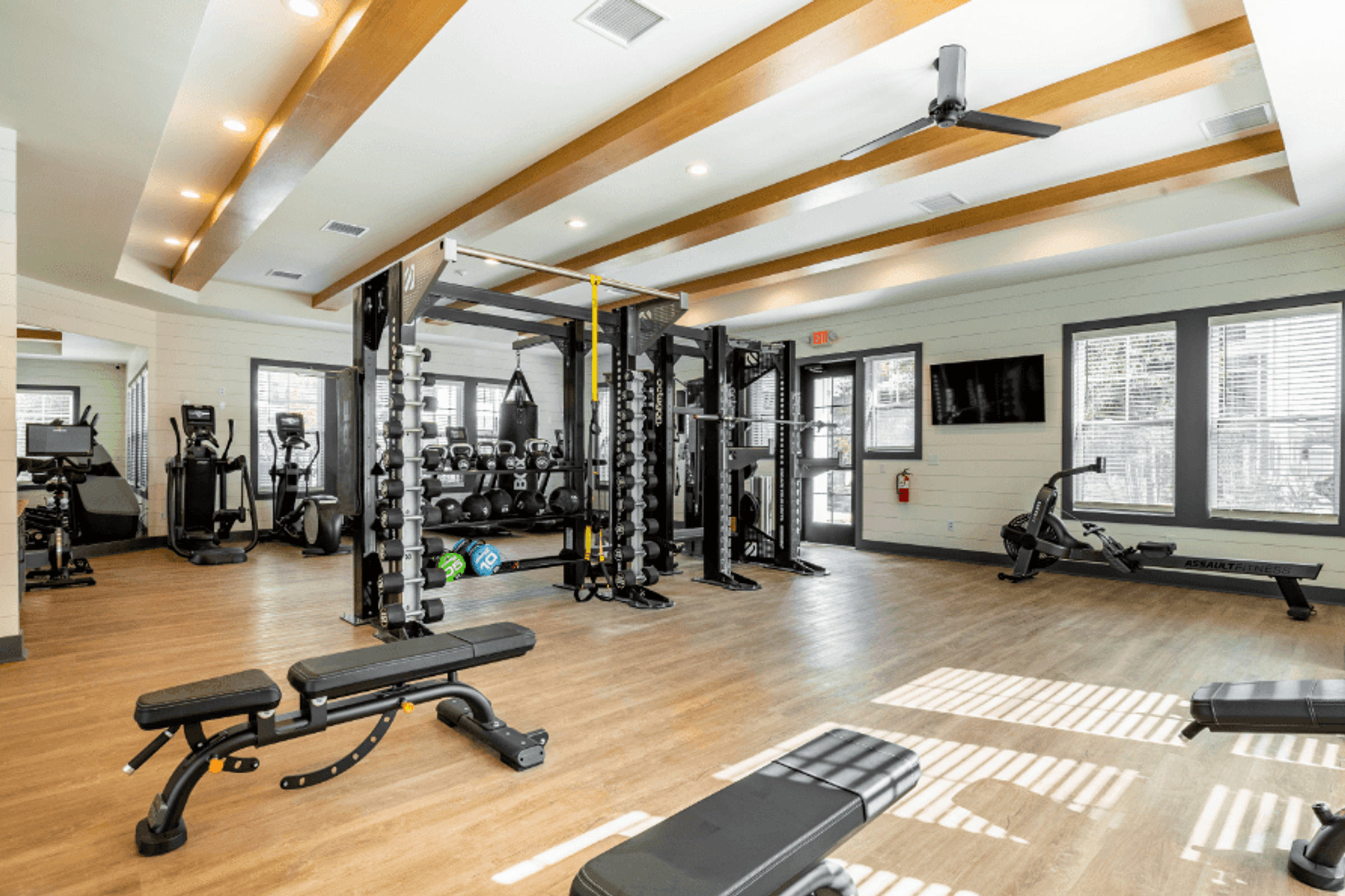 Expansive Fitness Center Equipped with Bikes, and Free Weights