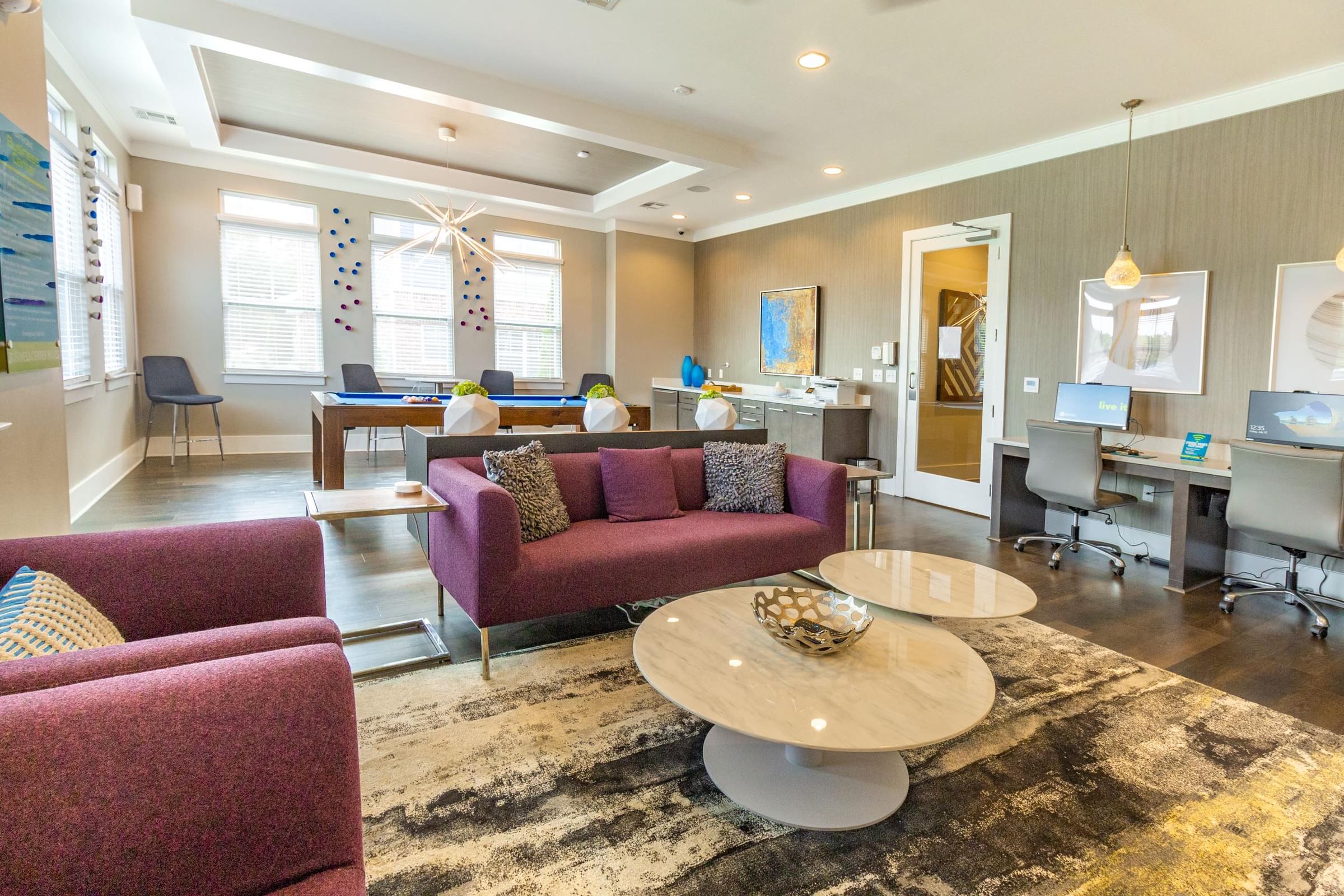 a living room with couches and a coffee table