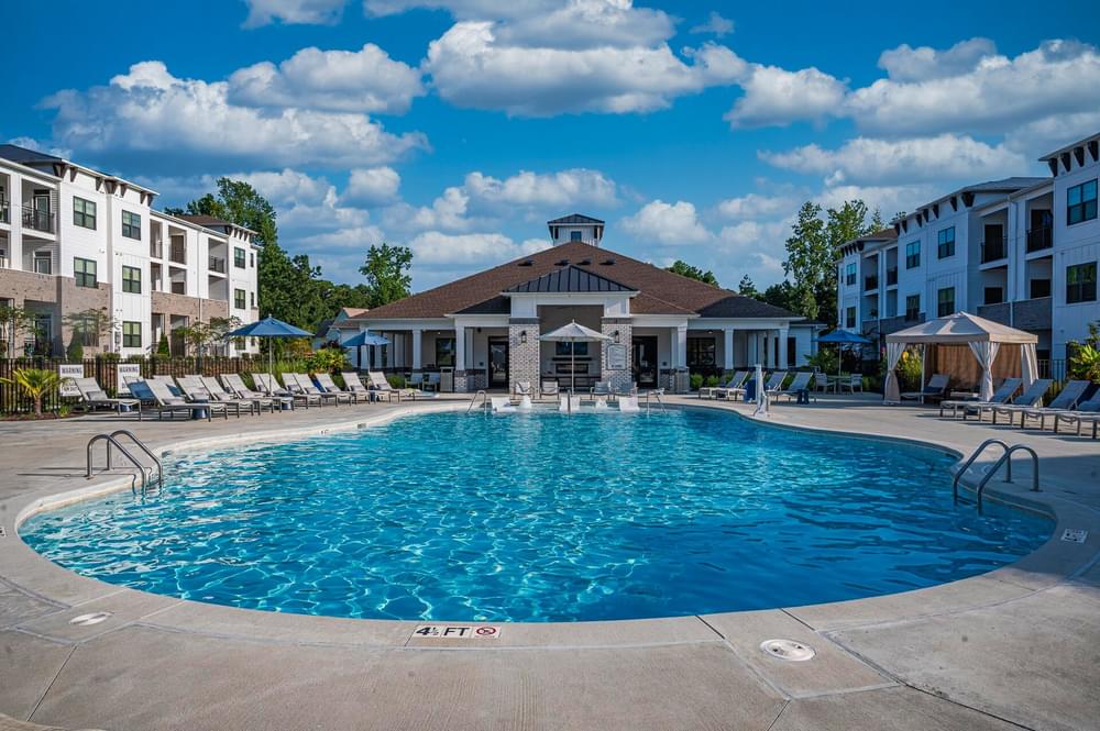 the swimming pool at the residence on lamar apartment homes for rent