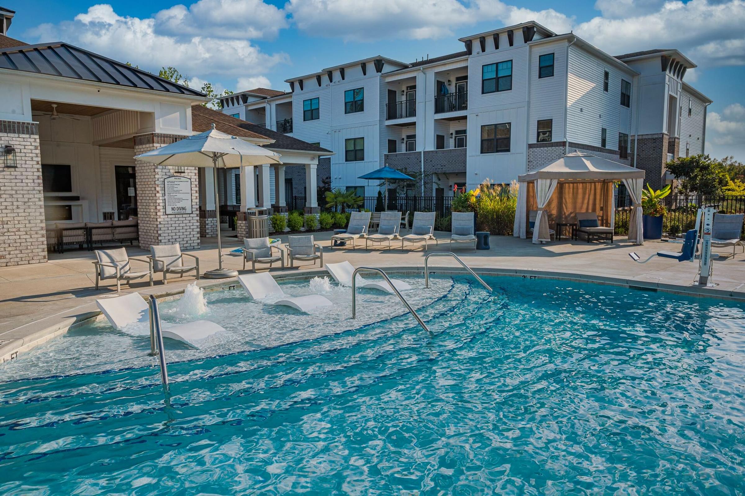 Saltwater Swimming Pool With Cabanas and Sundeck