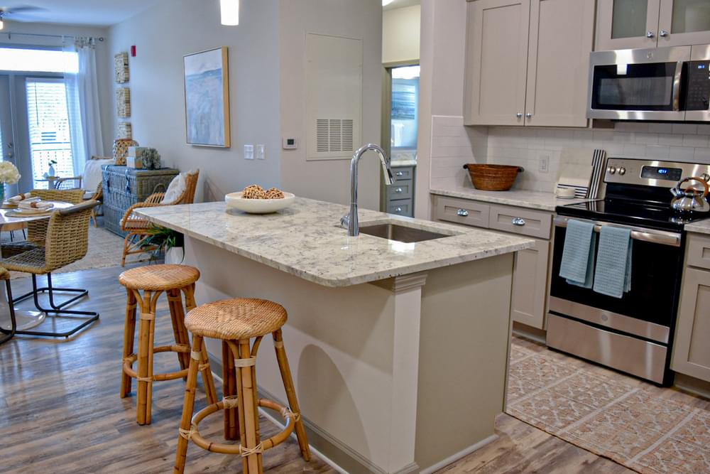 Kitchen island with granite counter and stylish decor Wilmington NC