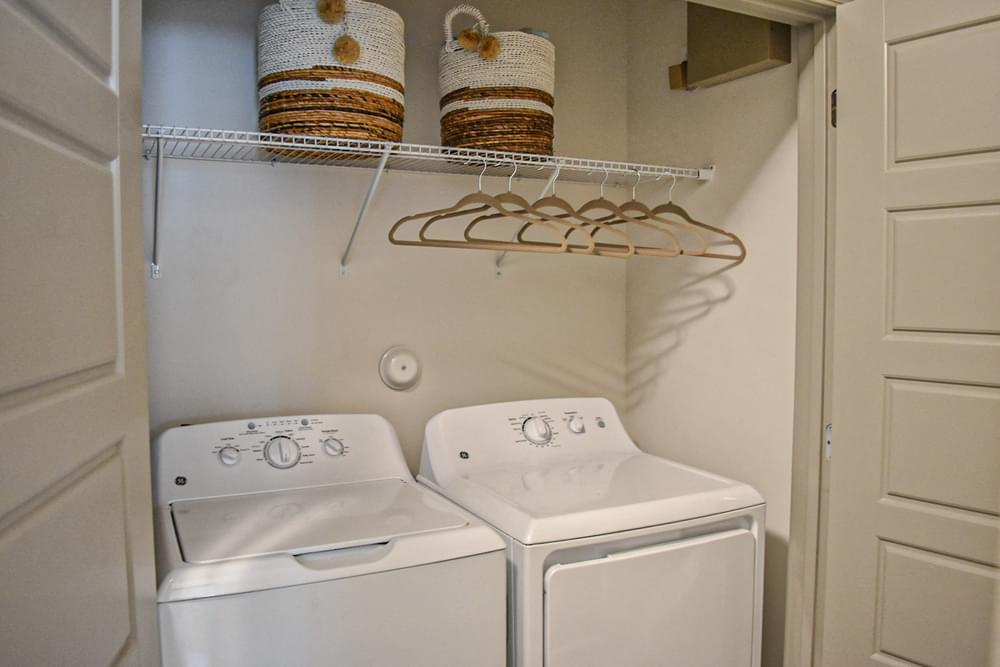 Full-sized washer dryer closet in apartment Hawthorne at Smith Creek