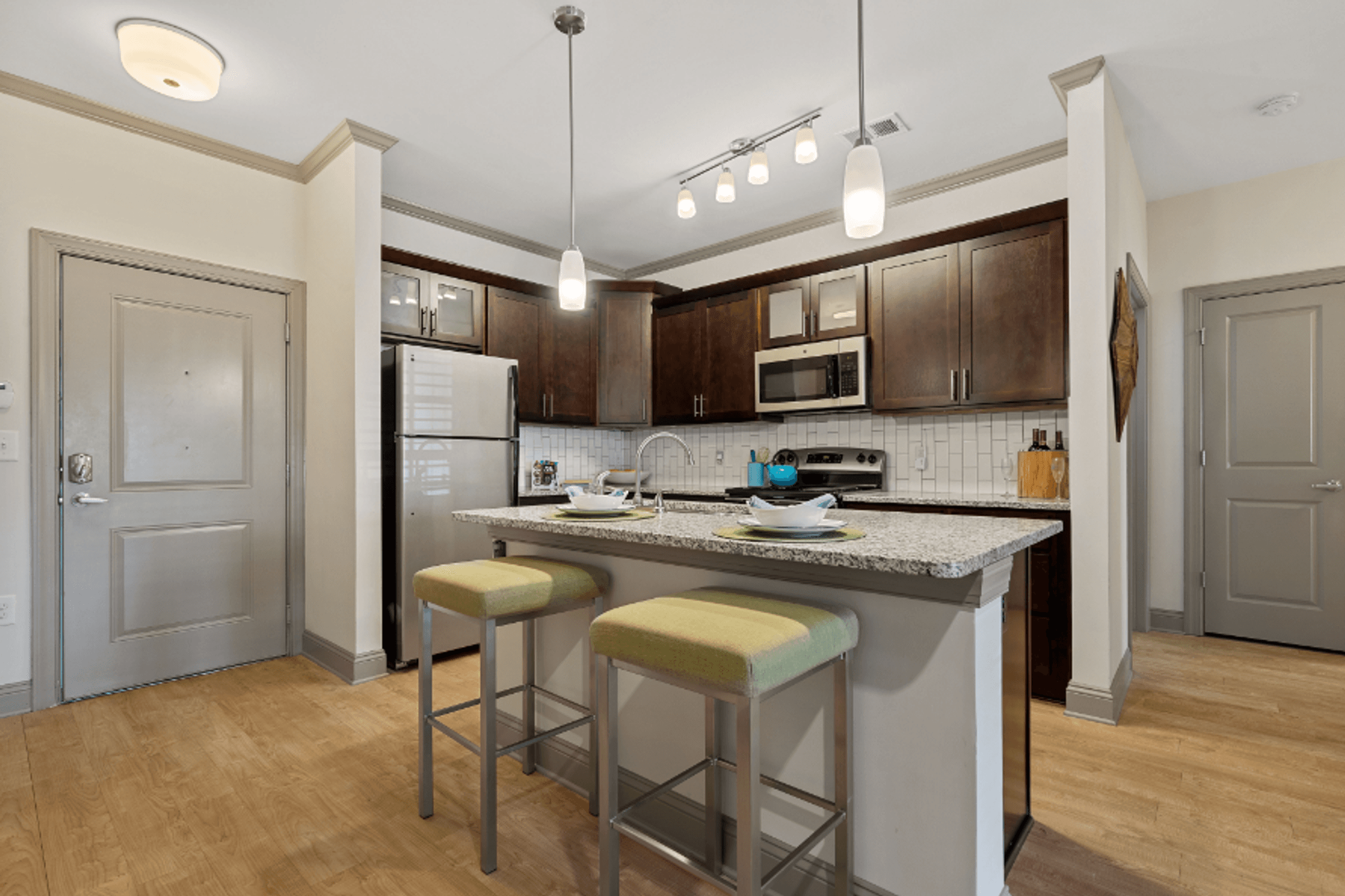 Modern Kitchen with Stainless Steel Appliances and Granite Countertops
