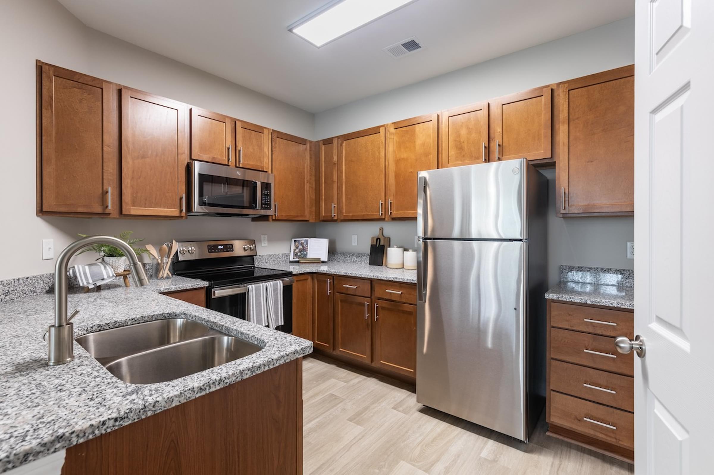 Spacious Kitchen With Granite Countertops