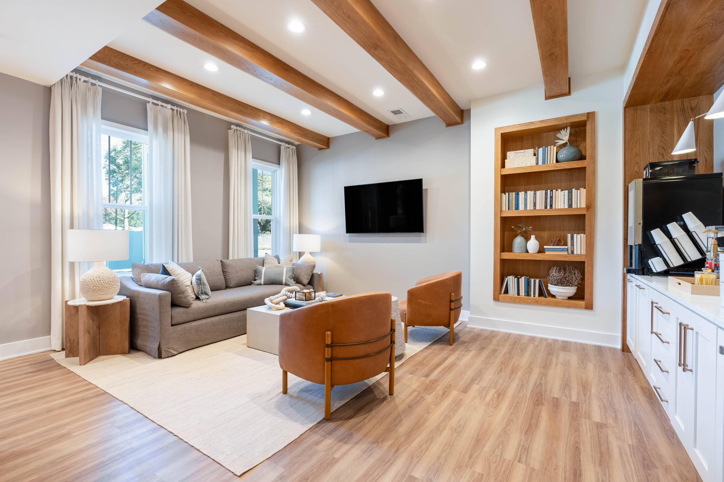 Resident Lounge with Bookshelves and Complimentary Coffee Bar