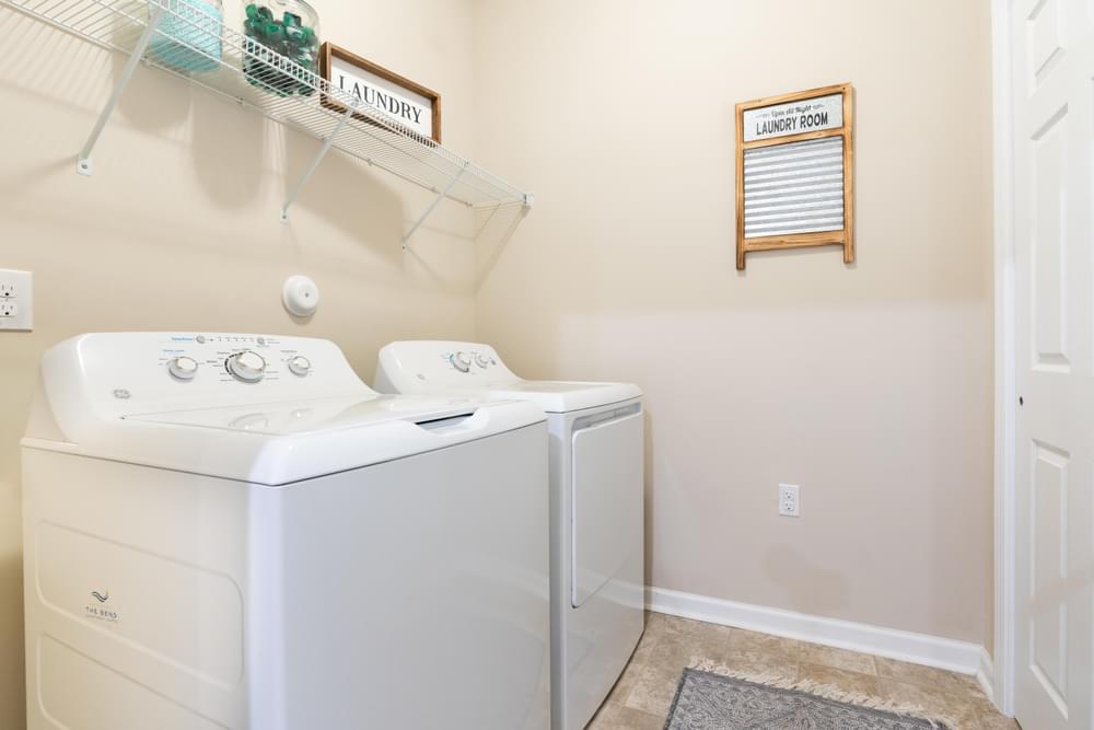 a washer and dryer in the laundry room of a house
