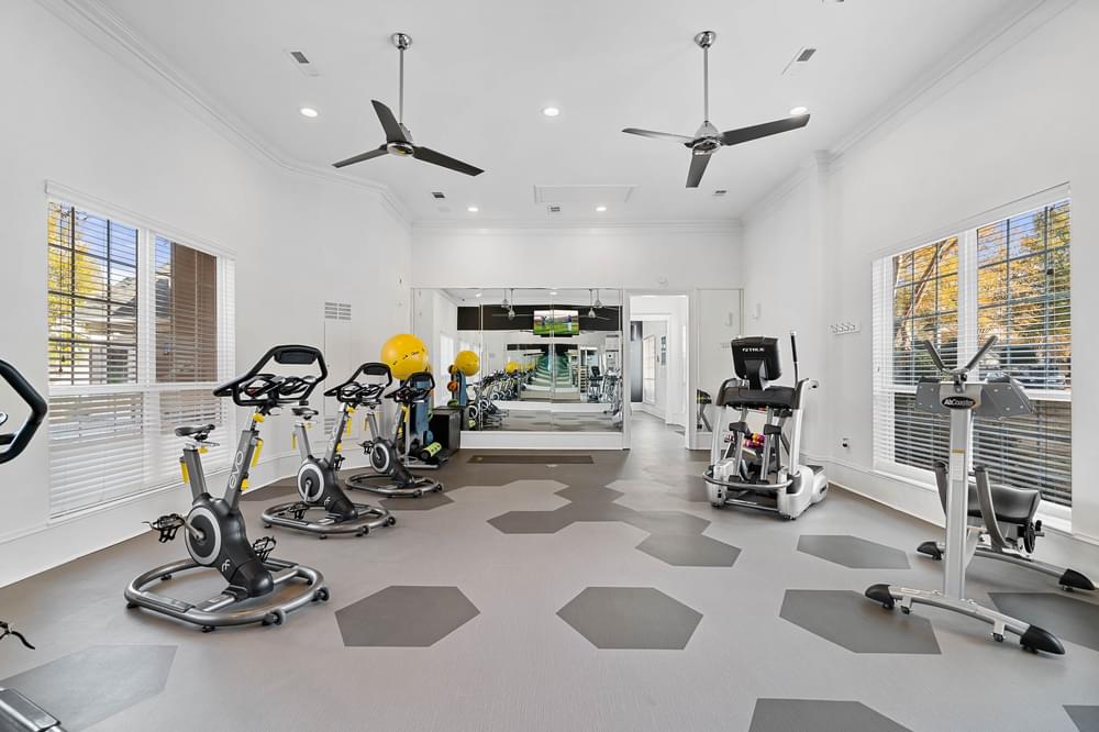 Elite fitness center with weights and cardio equipment at Hawthorne at the Carlyle in Greenville, SC