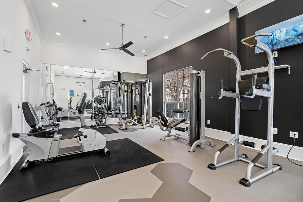 Elite fitness center with weights and cardio equipment at Hawthorne at the Carlyle in Greenville, SC