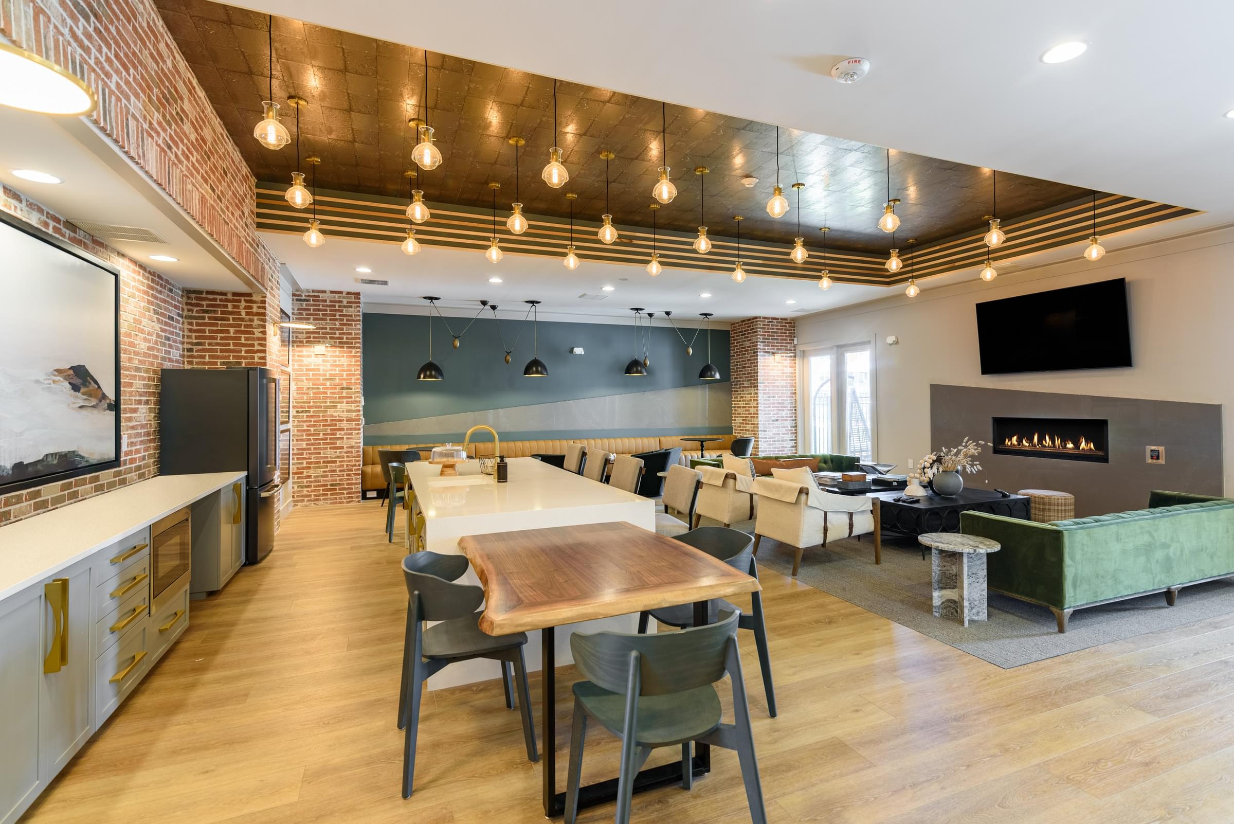 A modern kitchen with a dining table and chairs