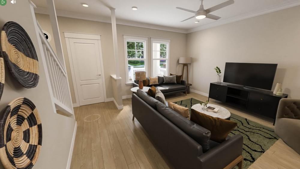 Large apartment kitchen with ample cabinet storage, built-in wine storage, and stainless steel appliances