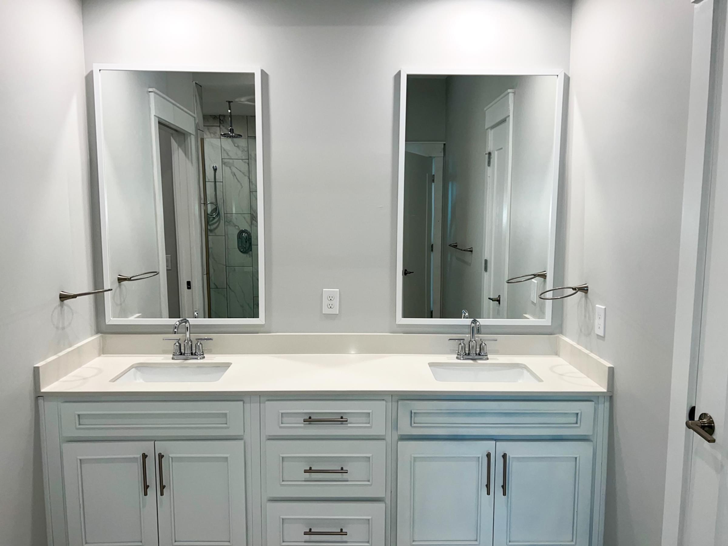 Double vanity sinks in bathroom