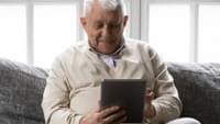 Elderly Man Using a Tablet