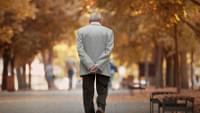 Elderly Man Walking Alone