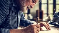 Elderly Man Writing
