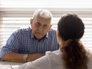 Elderly Person Talking About Diagnosis